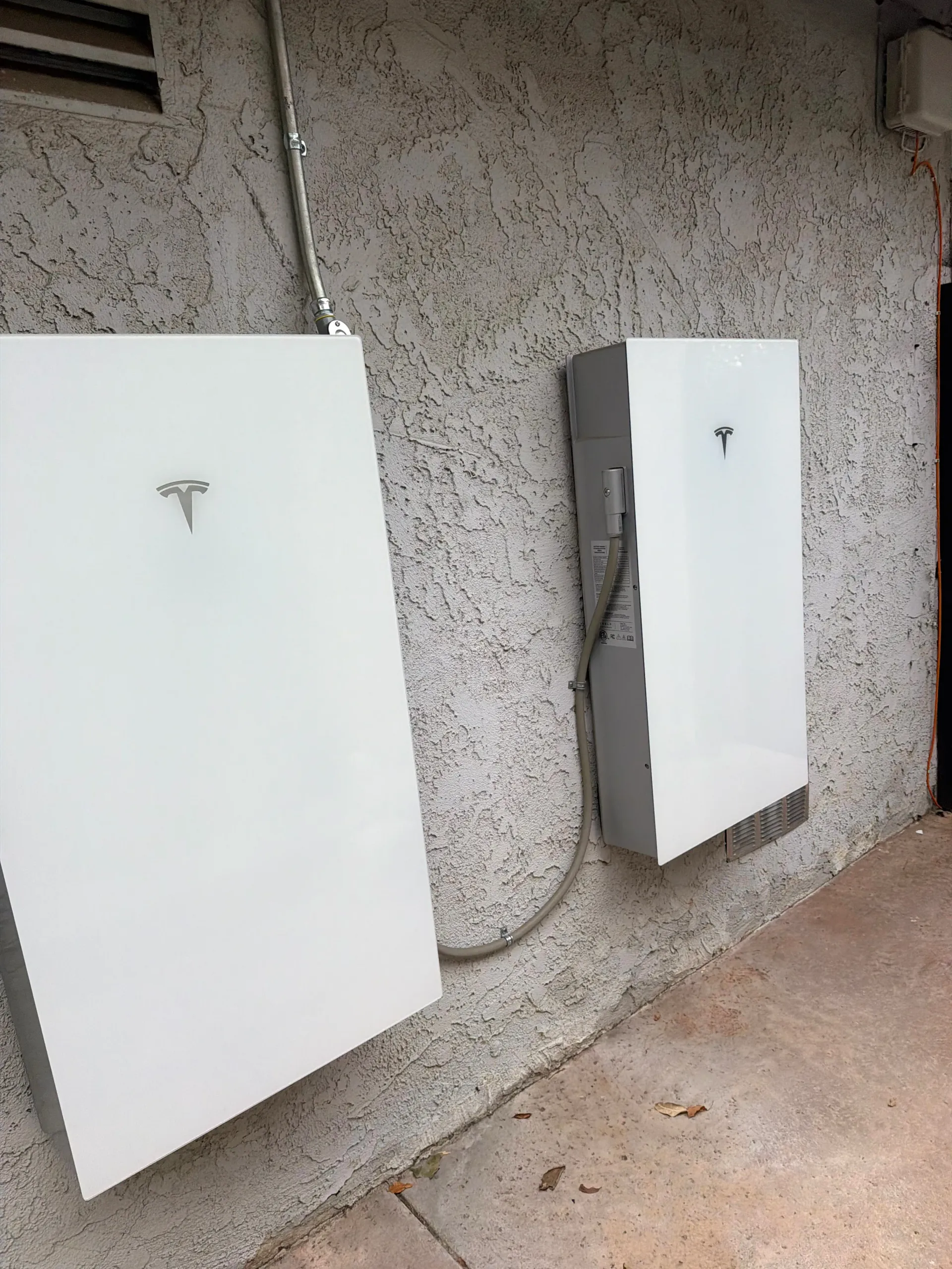 Tesla charging installation work by LED Guys electrician